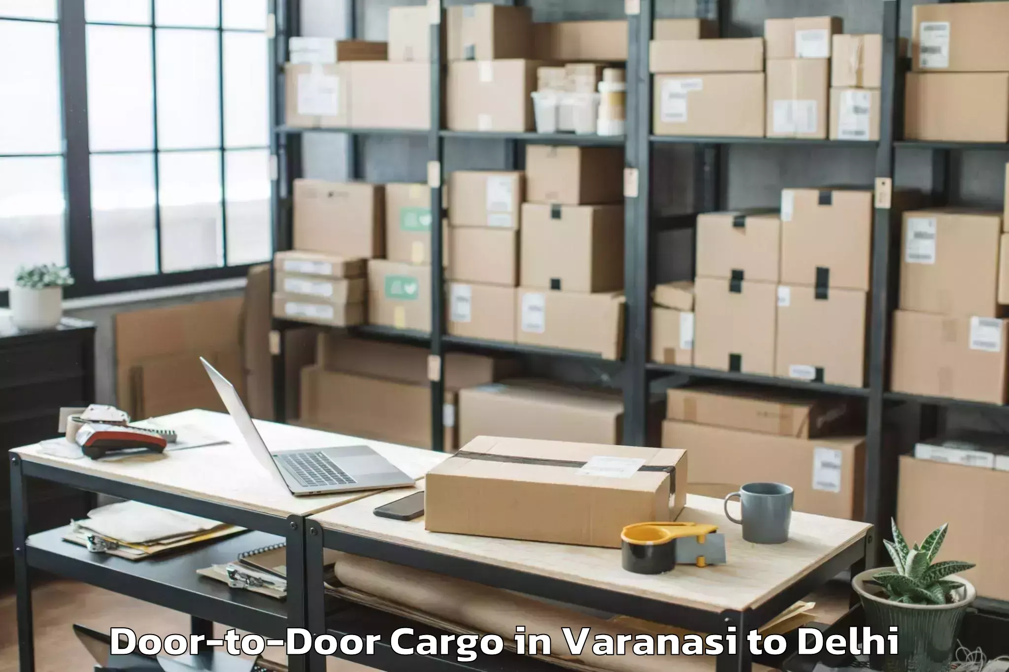 Book Varanasi to Hauz Khas Door To Door Cargo Online